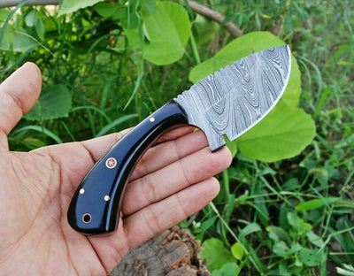 Premium Handmade Damascus Steel Skinning Knife for Outdoor Enthusiasts - Korvel