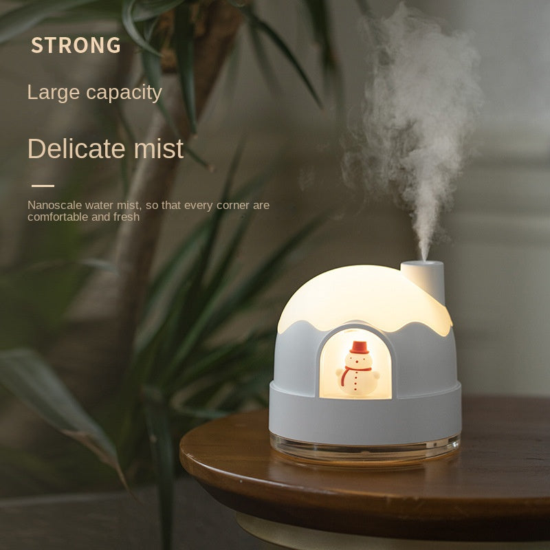 Humidificateur de nuit en forme de maison enneigée