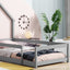 Lit simple taille jumeau en bois gris avec tête de lit en forme de maison