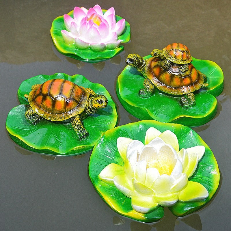 Turtle resin ornaments floating on the water surface - Korvel