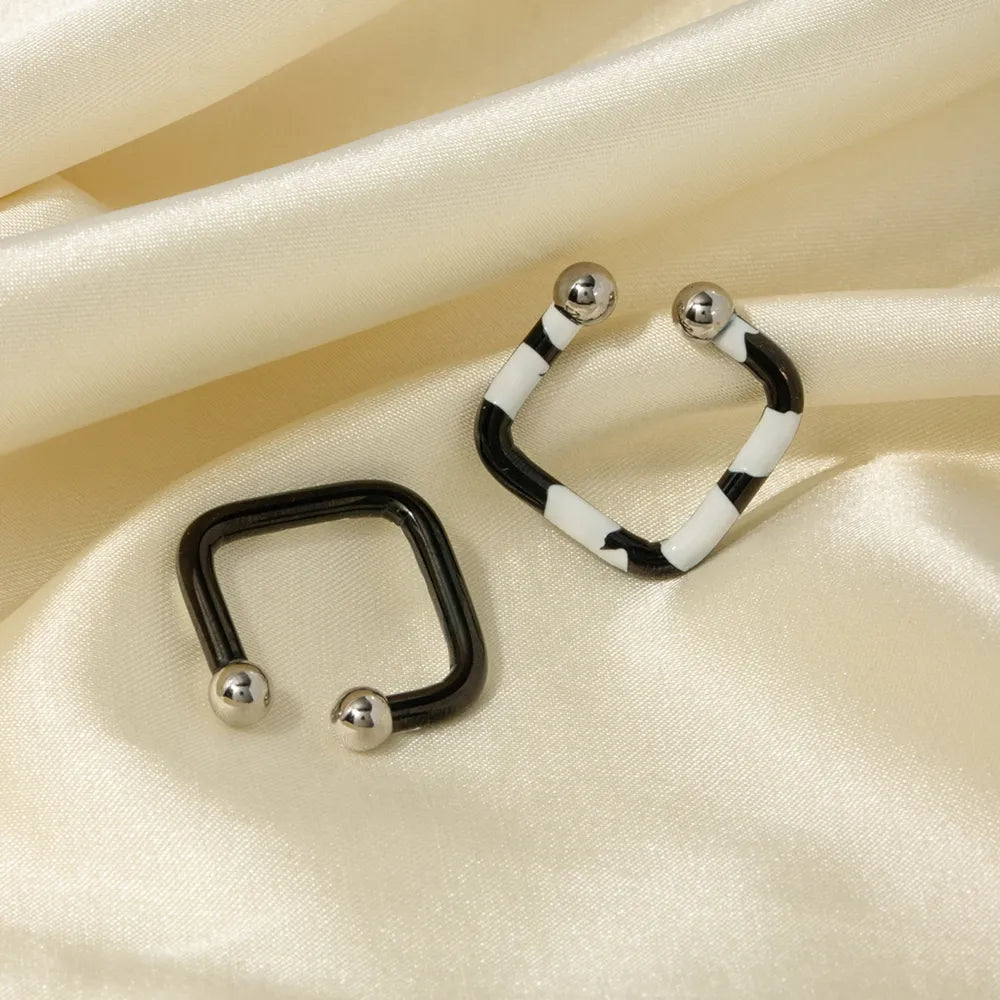 Boucles d'oreilles en acier inoxydable avec goutte d'huile