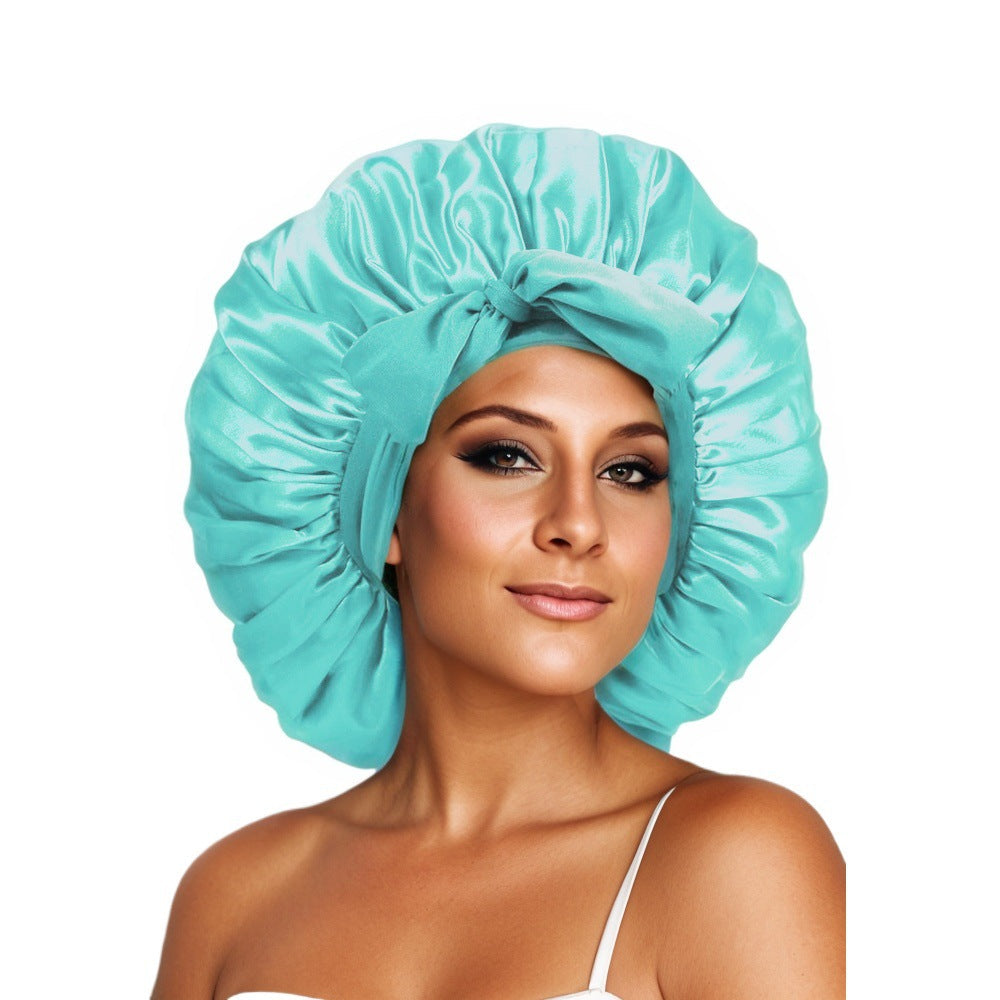 Turban élégant à large bord avec détail en nœud