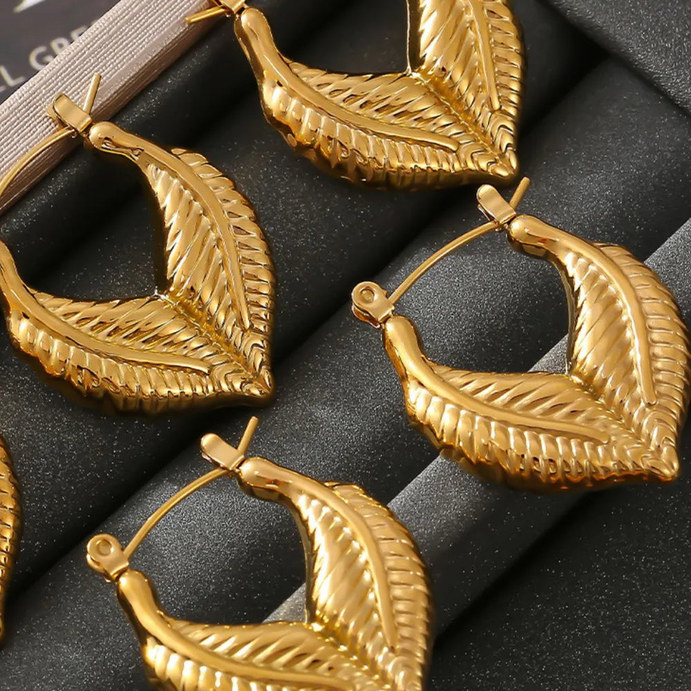 Leaf patchwork heart-shaped earrings with a niche design and titanium steel earrings - Korvel