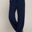 Pantalons de survêtement avec détail imprimé à la taille