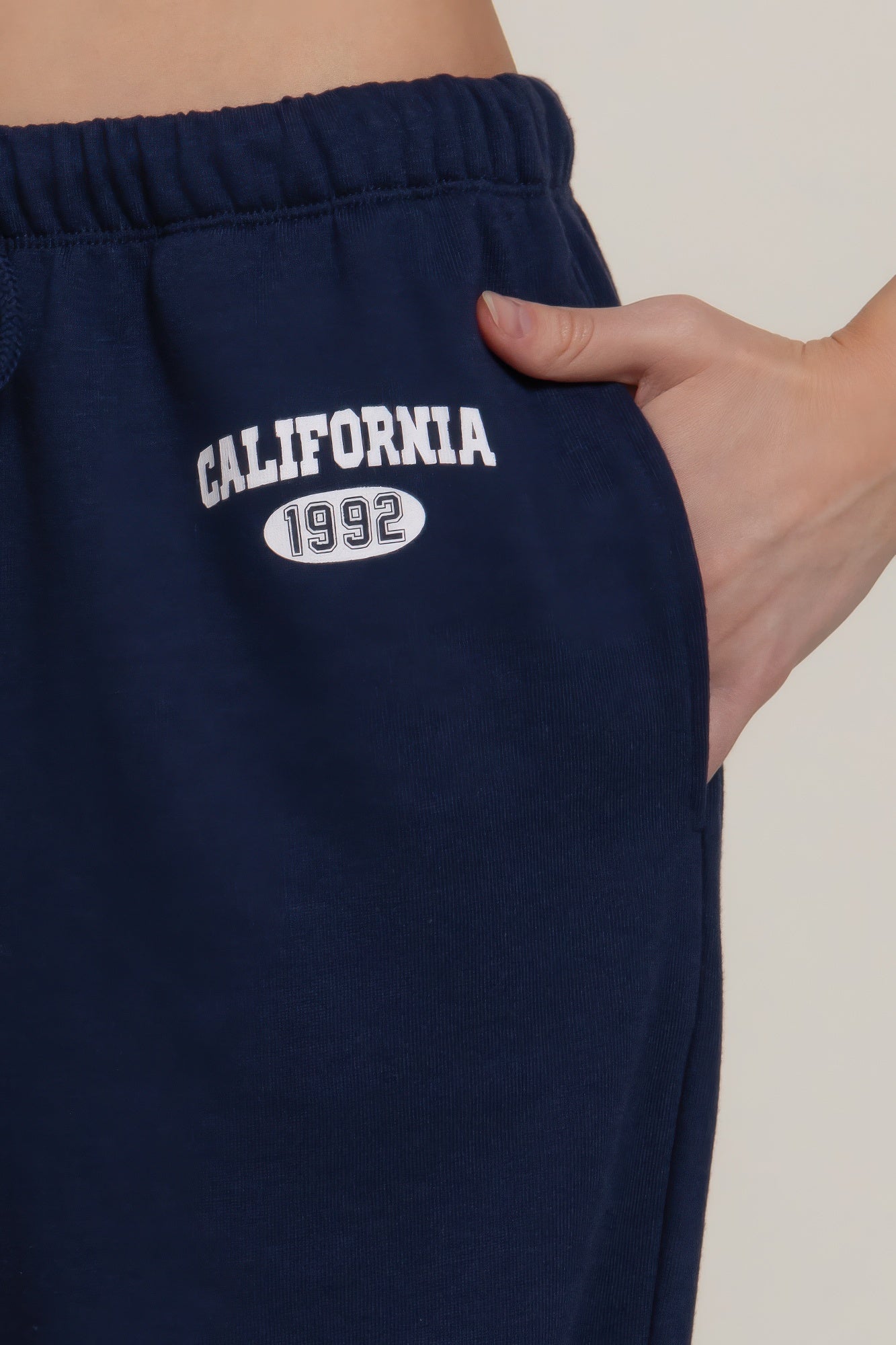 Pantalons de survêtement avec détail imprimé à la taille