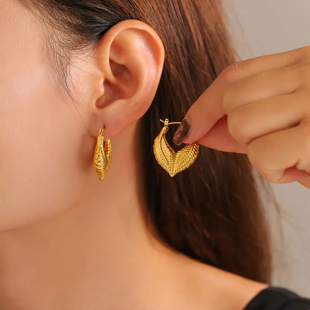 Leaf patchwork heart-shaped earrings with a niche design and titanium steel earrings - Korvel