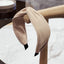 Fashionable fabric cross bow headband - Korvel