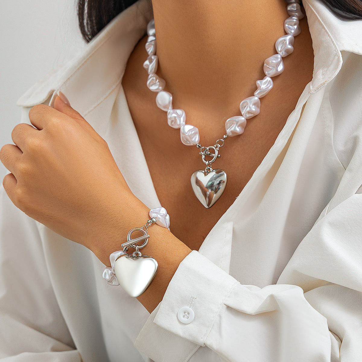 Ensemble de collier pendentif creux en forme de cœur élégant