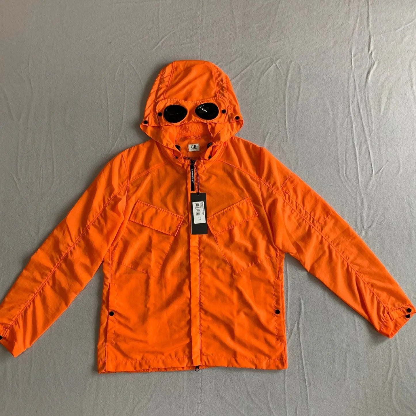 Veste à capuche coupe-vent