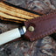 Handcrafted Damascus Steel Camping Knife with Elegant Camel Bone Handle - Korvel