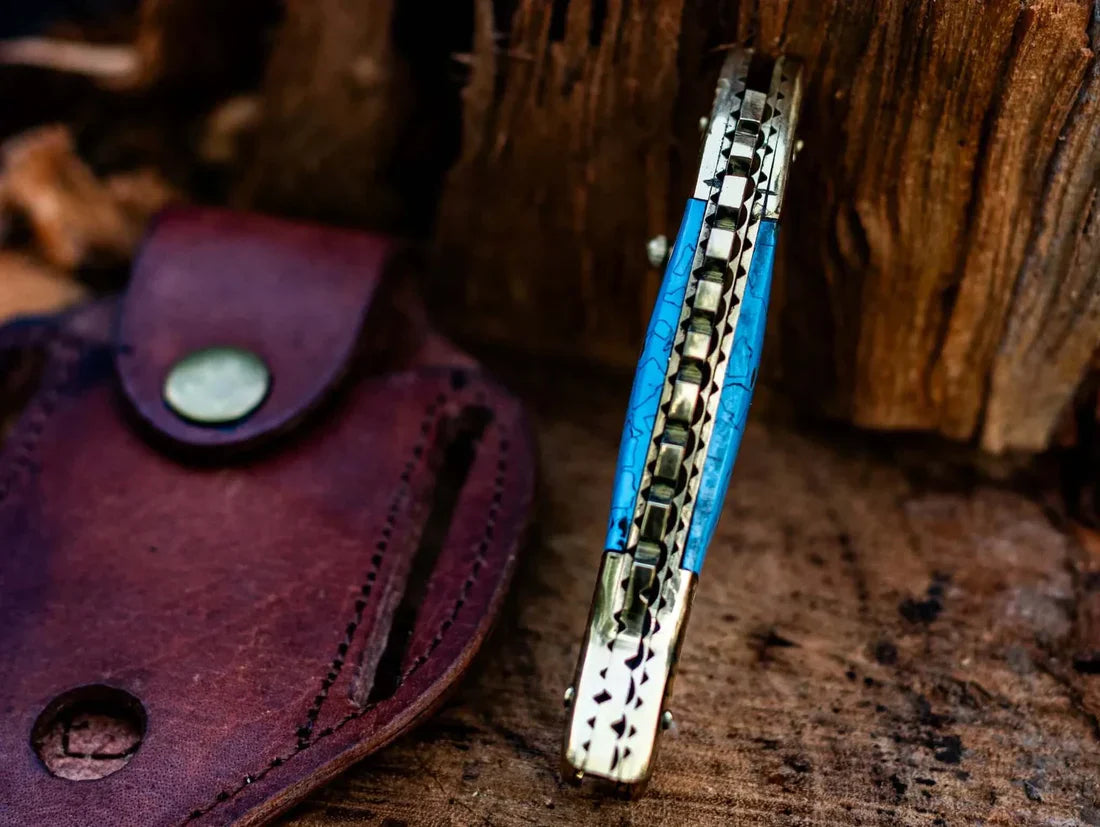 Artisan Crafted Fish-Inspired Damascus Steel Folding Knife with Epoxy Resin Handle & Brass Details - Includes Premium Leather Sheath - Korvel