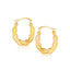 Boucles d'oreilles créoles torsadées ovales en or jaune 10k