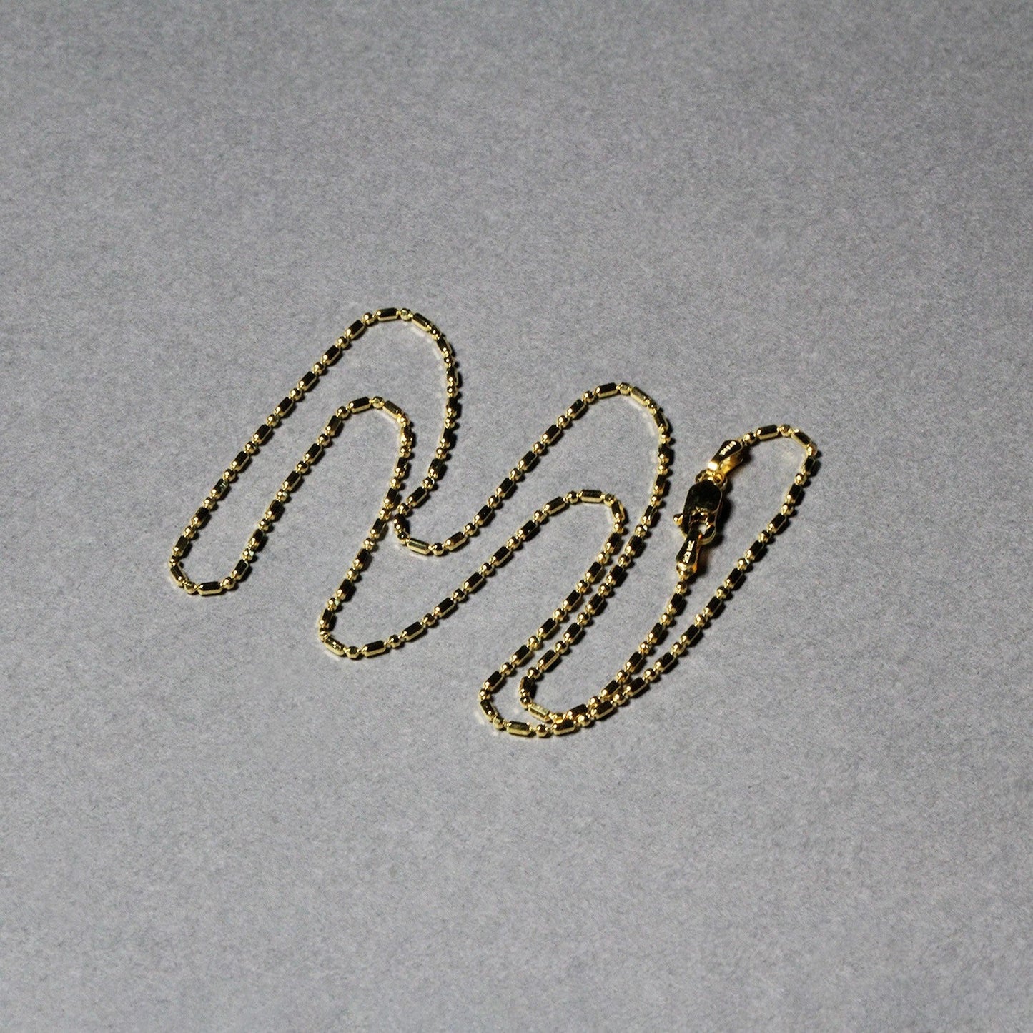Cadena de cuentas alternas cortadas con diamante de oro amarillo de 14k - 1.2mm