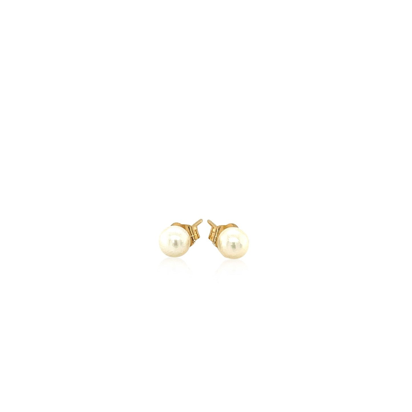 Pendientes de perlas cultivadas de agua dulce en oro amarillo de 14k
