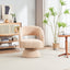 Fauteuil pivotant en tissu teddy nude