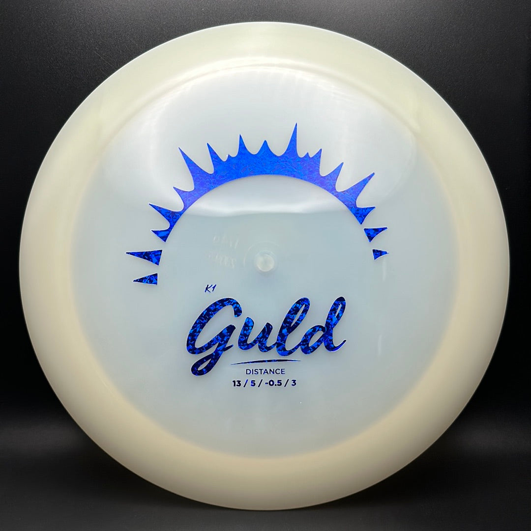 K1 Glow Guld - First Run Disc Golf Driver
