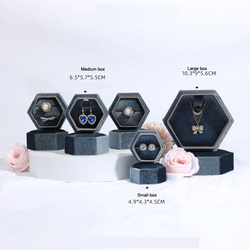Boîte à bijoux en velours hexagonale élégante