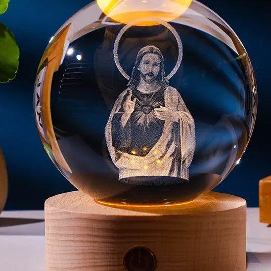 Luminous crystal ball with carved Jesus solid wood base for home decoration - Korvel