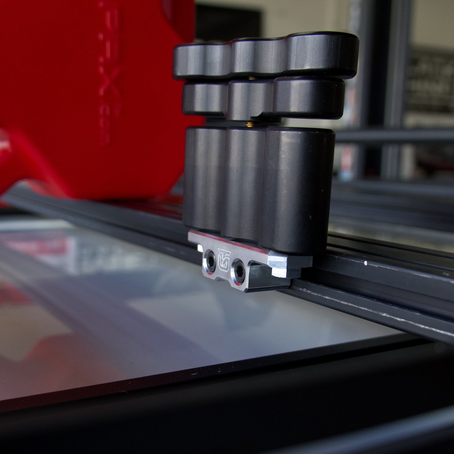 Billet aluminum Rotopax mount adapter for extrusion roof rack cross bars. - Korvel