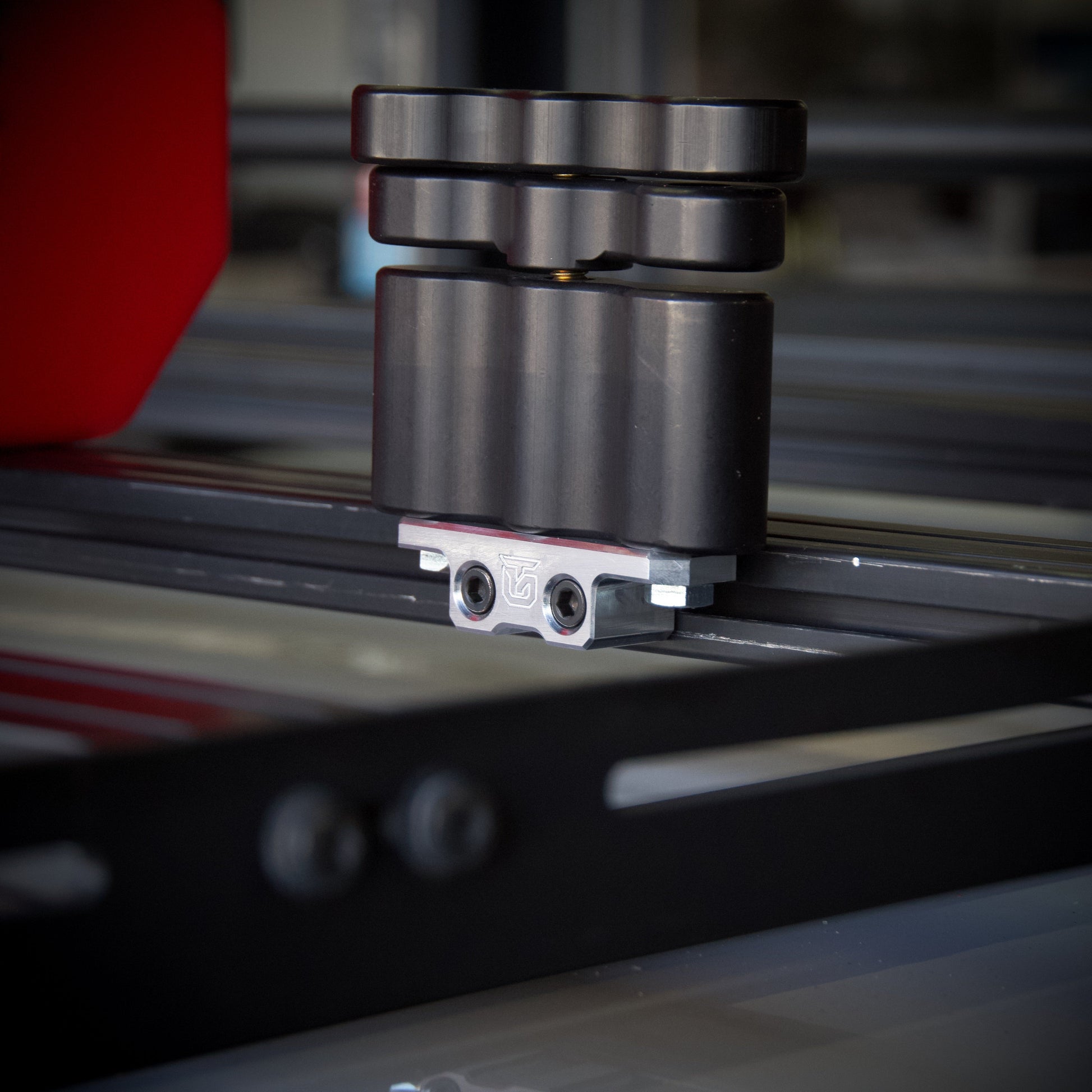 Billet aluminum Rotopax mount adapter for extrusion roof rack cross bars. - Korvel
