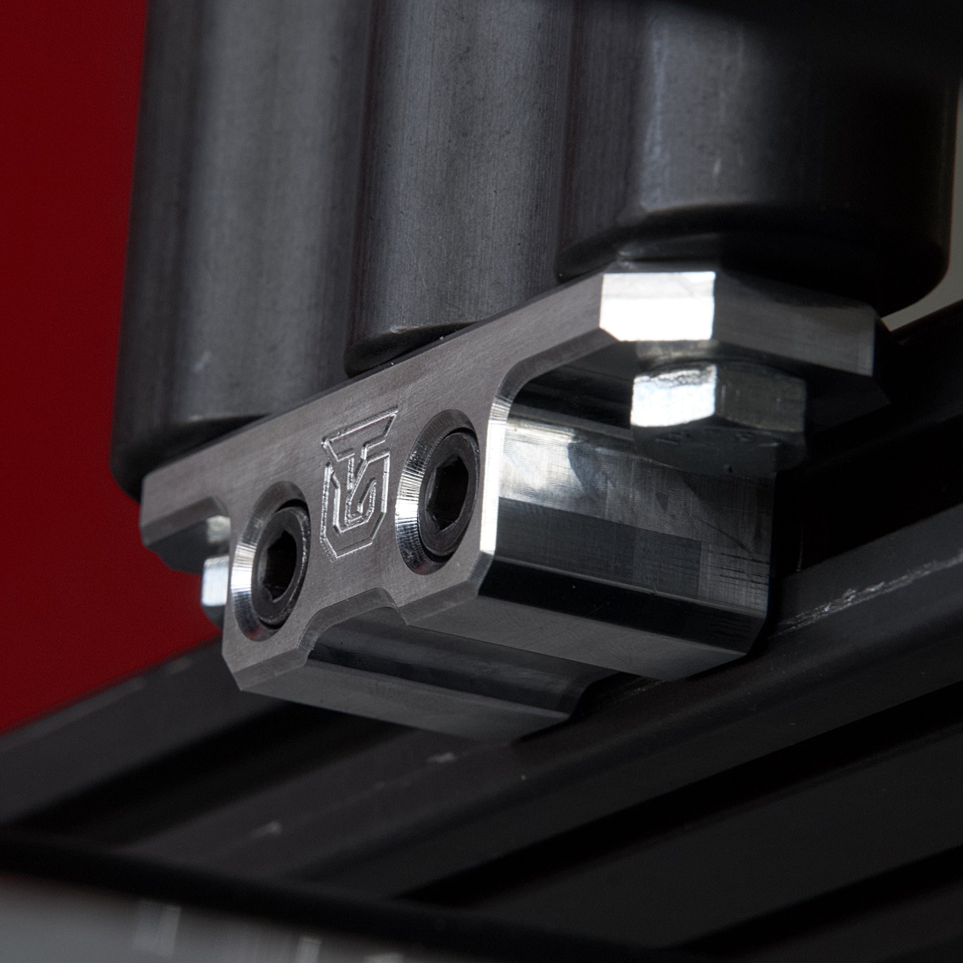 Billet aluminum Rotopax mount adapter for extrusion roof rack cross bars. - Korvel