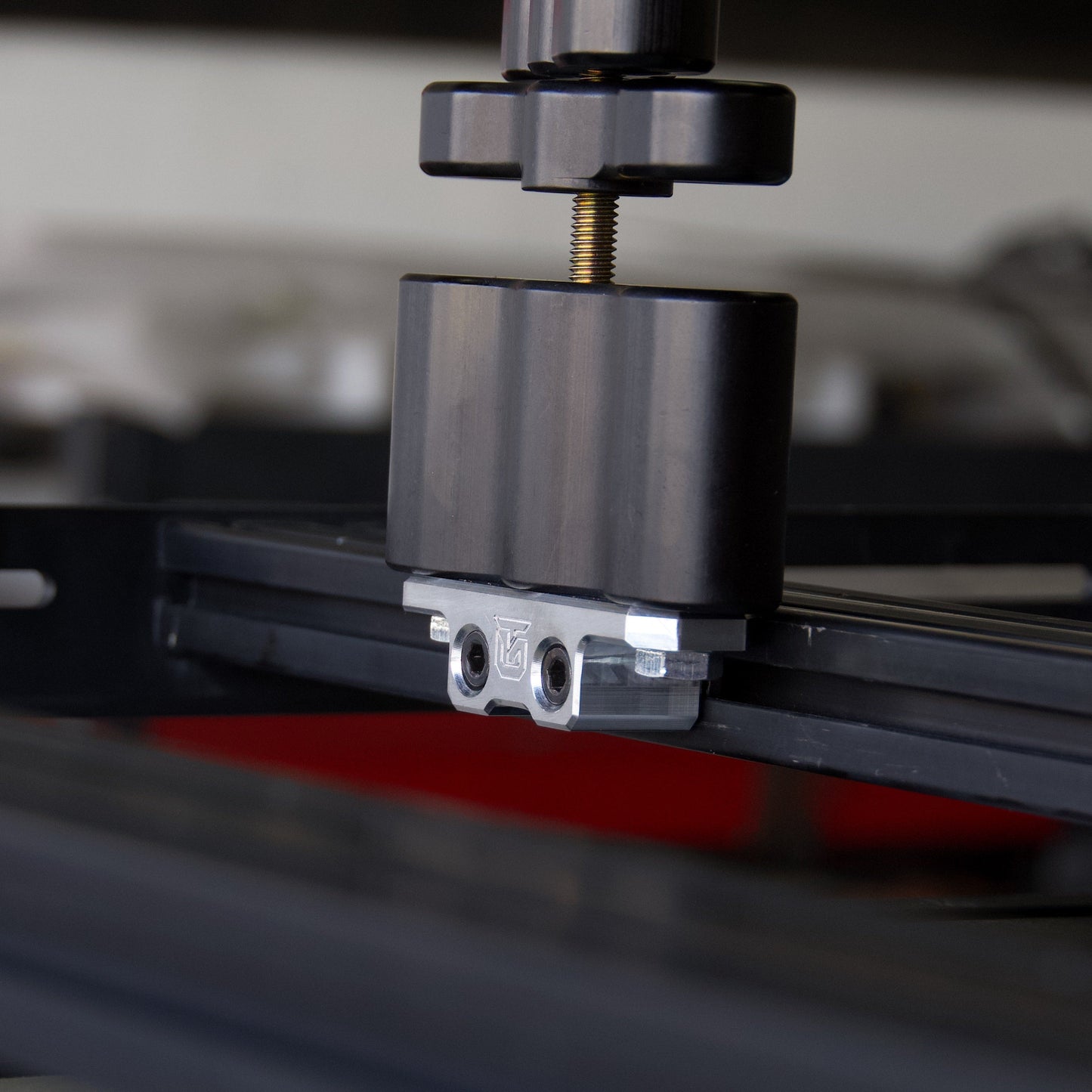 Billet aluminum Rotopax mount adapter for extrusion roof rack cross bars. - Korvel