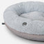 Cama para perros en forma de dona gris de felpa para una comodidad máxima