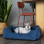Cama para perros de terciopelo azul lujosa