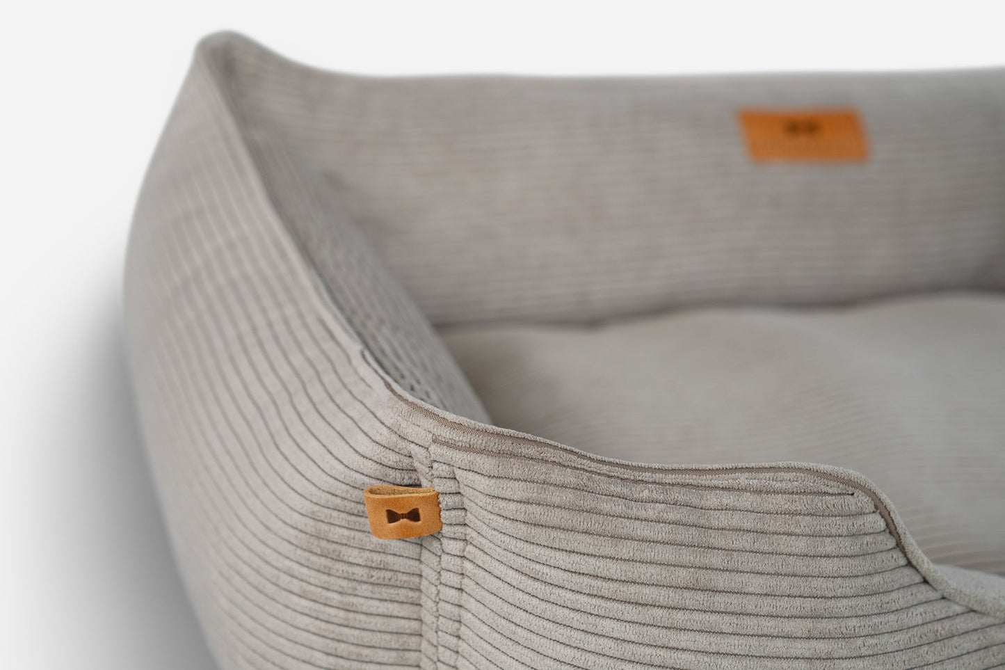 Cama para perros de terciopelo taupe lujosa