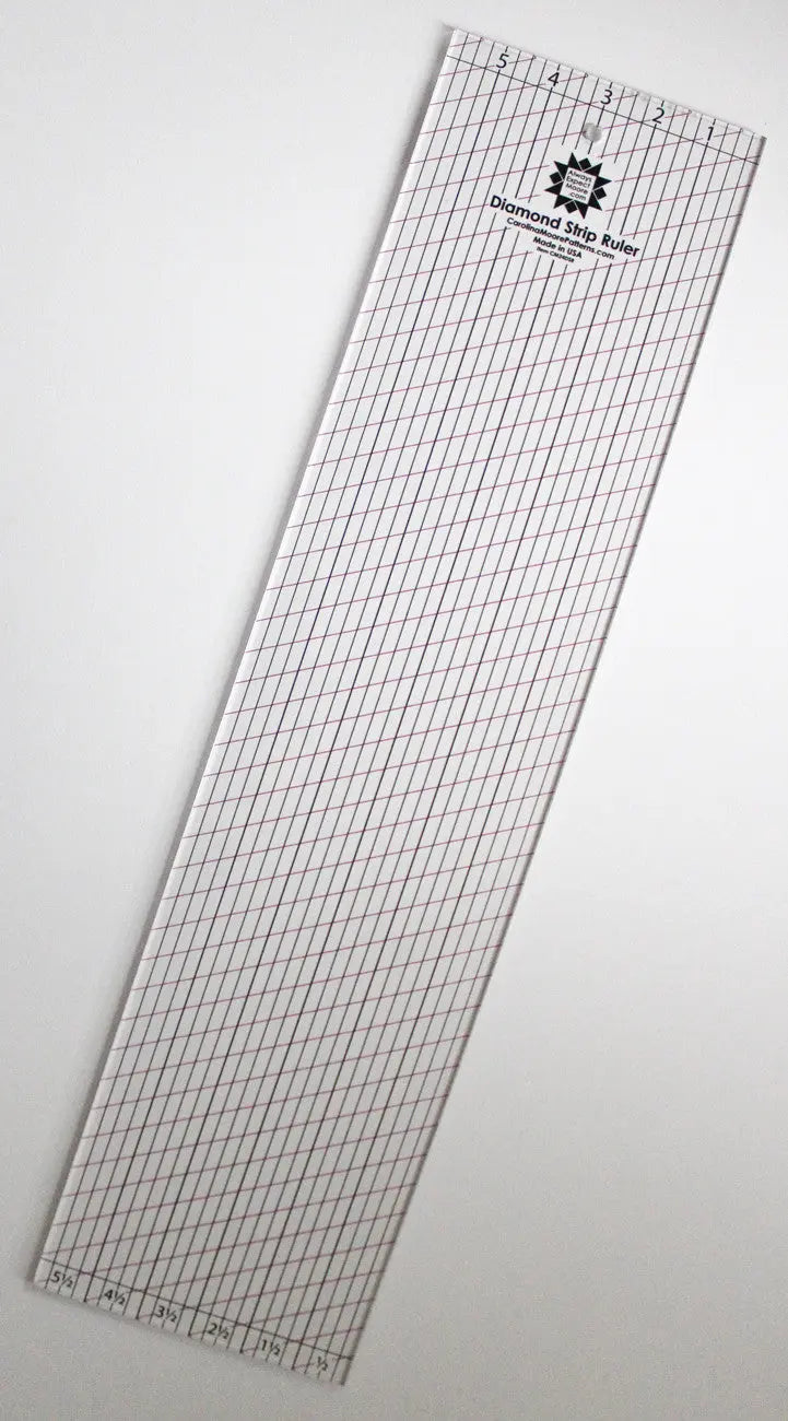 Règle à bandes en diamant pour la couture