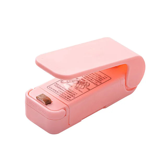 Mini sealing machine small household plastic sealing machine snack moisture-proof sealing machine - Korvel