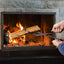 The Grizzly Grabber Fire Tongs are 26 - inch, heavy - duty, rust - resistant tools for camping and indoor/outdoor use. - Korvel
