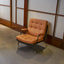 Living room chair with adhesive leather armrests, high backrest, metal legs, and soft padding (1 piece in brown) - Korvel