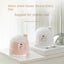 Humidificateur de nuit en forme de maison enneigée