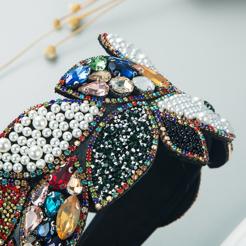 Diadème en forme de feuille en perles et strass