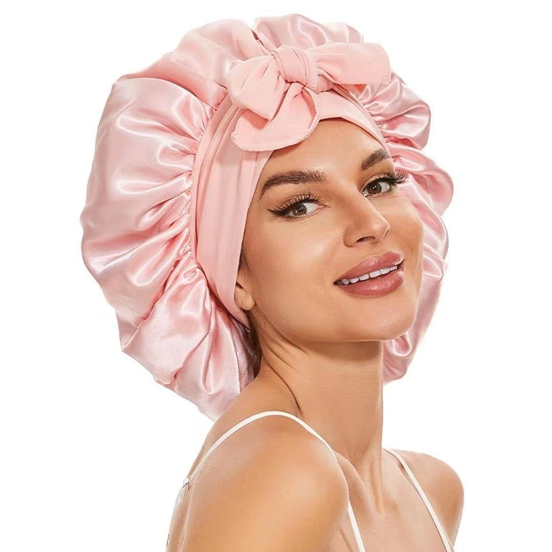 Turban élégant à large bord avec détail en nœud
