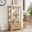 Light colored glass cabinet with adjustable glass frame, including cabinet light bulbs OAK with 2 doors and 1 drawer - Korvel