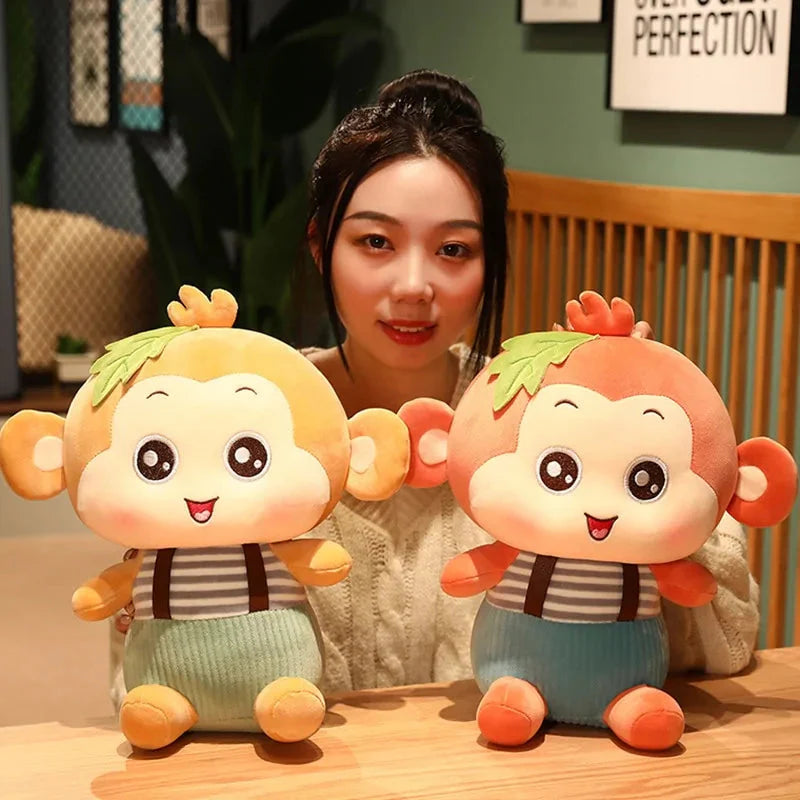 Jouets en peluche singe assis charmants pour tous les âges