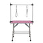 36 inch folding pet grooming table with stainless steel frame and rubber pad, equipped with adjustable armrests and clips (pink) - Korvel