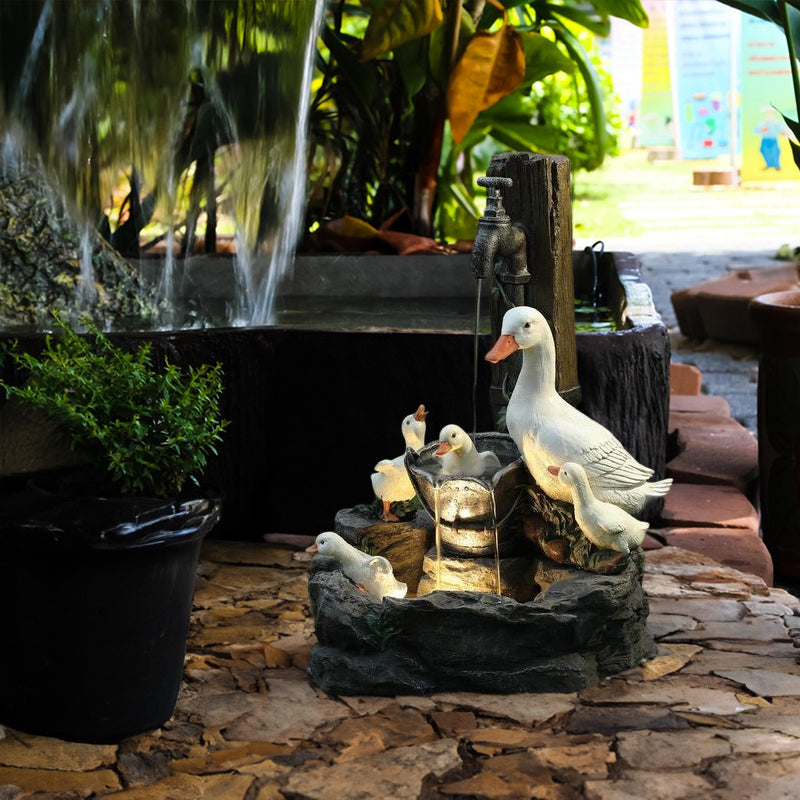 Solar resin duck garden fountain with LED squirrel design, outdoor decor (E2). - Korvel