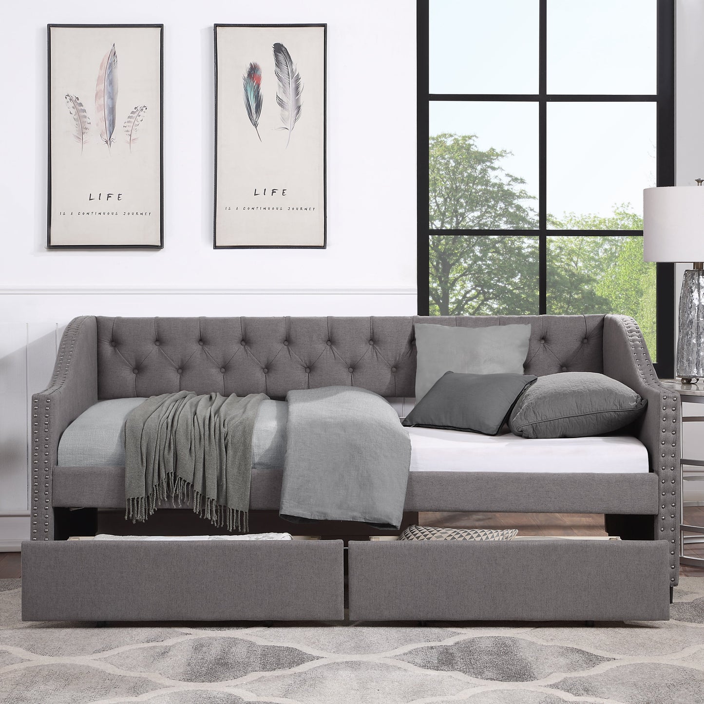 Cama nido tapizada de tamaño individual con dos cajones - Gris