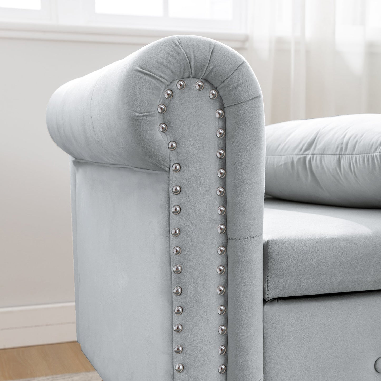 Chaise longue en velours gris avec rangement et coussin