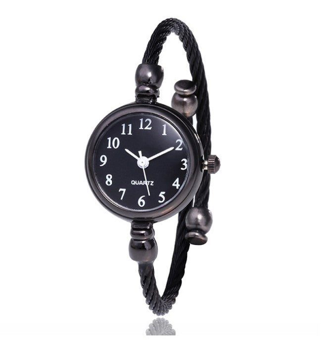 Montre à quartz élégante pour femmes avec design de bracelet ouvert