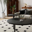 Modern coffee table with two display shelves, Black Faux marble surfaces, Tripod-inspired base,Rounded tabletop edges - Korvel