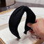 Fashionable fabric cross bow headband - Korvel