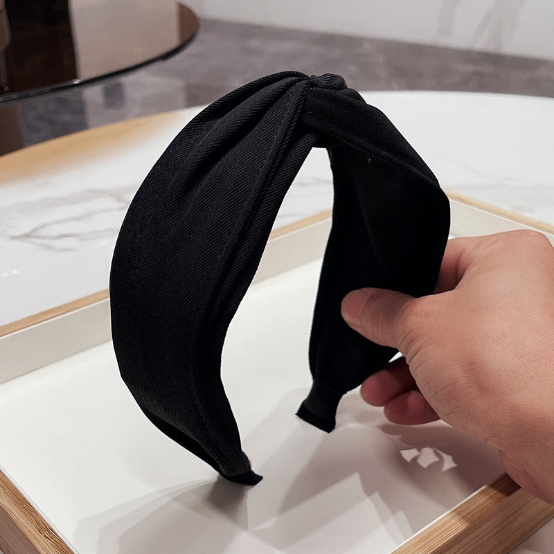 Fashionable fabric cross bow headband - Korvel