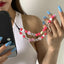 Fashion daisy acrylic letter bag, mobile phone hanging chain, handmade bead weaving accessories - Korvel
