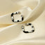Boucles d'oreilles en acier inoxydable avec goutte d'huile