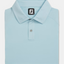 Polo de golf liso con mezcla de texturas FootJoy
