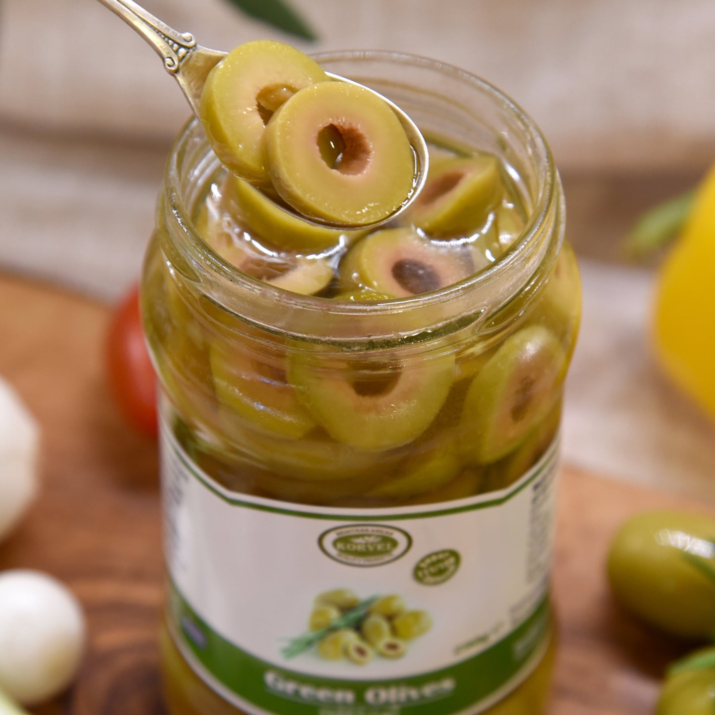KORVEL Greek Green Sliced Halkidiki Olives – Super Colossal – 10.65 oz Glass Jar